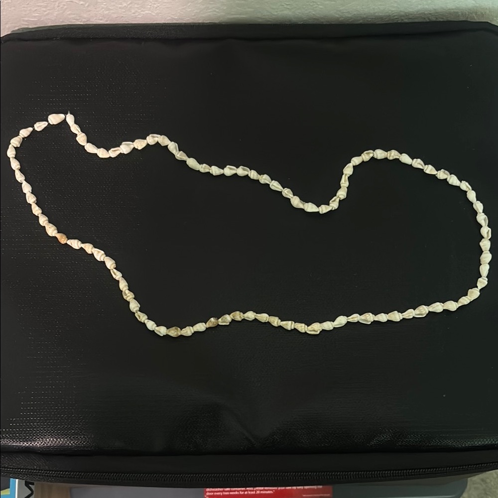 Cream Necklace with Intricate Patterns